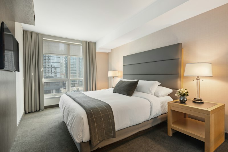 Executive Room with modern king bed and warm aesthetic